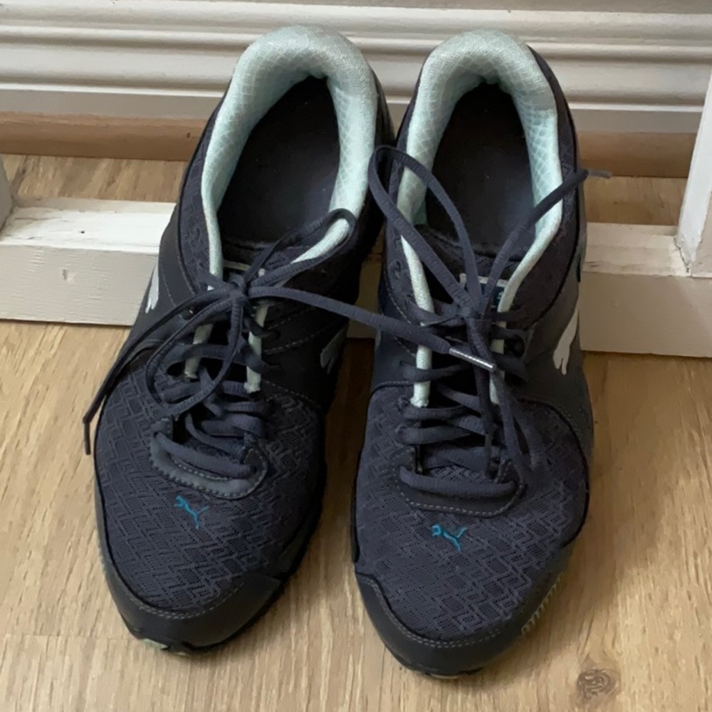 Cool navy and teal like new Puma running shoes